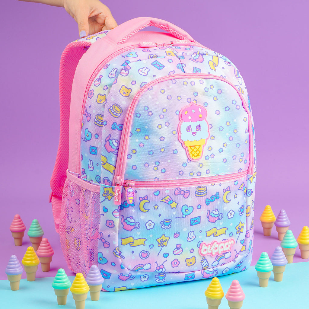 Woman holding a cute girls’ backpack for school. Featuring pink kawaii designs.