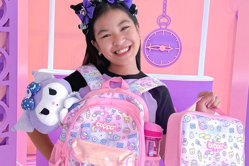Young girl with a pink Blippo backpack and kawaii accessories in a colorful room