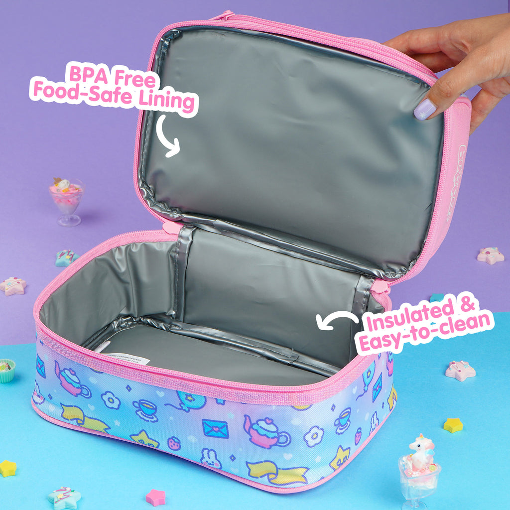 Woman opening a cute pink insulated lunch box designed for girls and featuring kawaii designs for school.